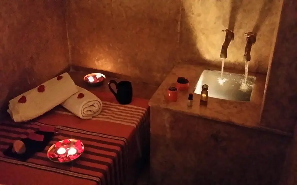 Traditional hammam interior with black soap and rhassoul clay in Marrakech